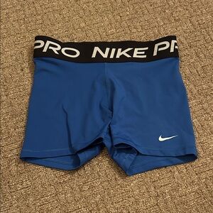 Nike Pro Dri-FIT Compression Shorts in Black and blue
